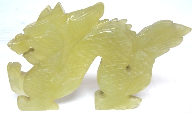 VINTAGE CHINESE ASIAN JADE DRAGON FIGURE: A VINTAGE CHINESE ASIAN JADE DRAGON FIGURE. PIECE MEASURES 4 1/2" BY 3".