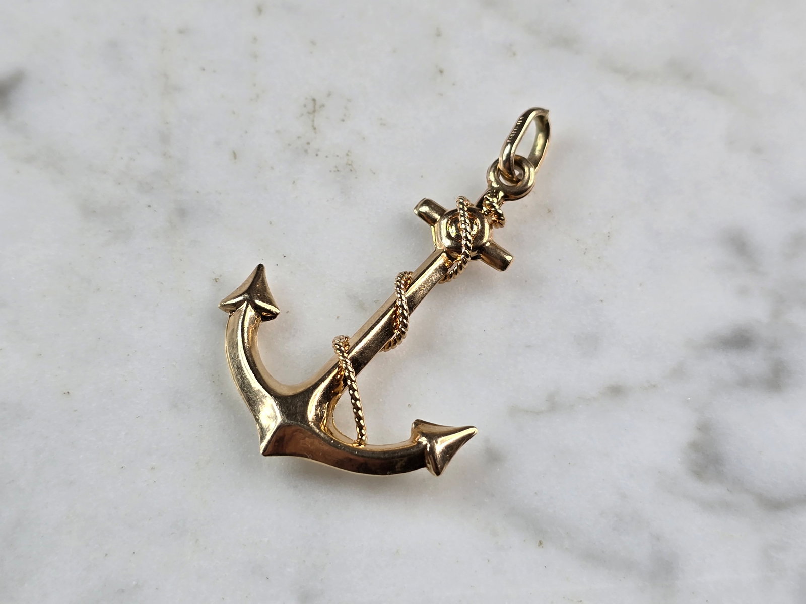 Vintage Estate 14K Yellow Gold Maritime Anchor Pendant: A VINTAGE ESTATE 14K YELLOW GOLD MARITIME ANCHOR PENDANT THAT WAS MADE IN ITALY. THE PENDANT WEIGHS 2.6g, AND MEASURES 1 5/8" LONG BY 1" WIDE. MAKES A GREAT GIFT FOR THAT SOMEONE SPECIAL. ANY QUESTION