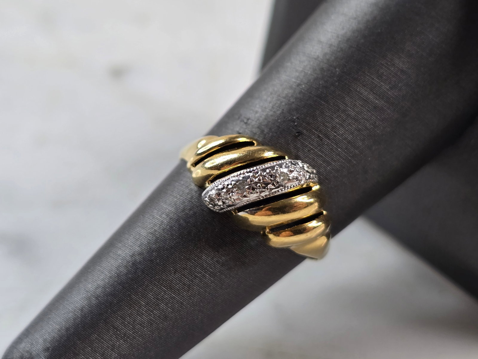 Womens Vintage Estate 18K Gold Modernist Diamond Ring: A WOMENS VINTAGE ESTATE 18K YELLOW & WHITE GOLD MODERNIST DIAMOND RING. THERE ARE 4 TINY DIAMONDS. THE RING IS A SIZE 7.25. AND WEIGHS 1.8g. THE WIDTH OF THE RING IS 3/8". THIS WOULD MAKE A LOVELY GIF