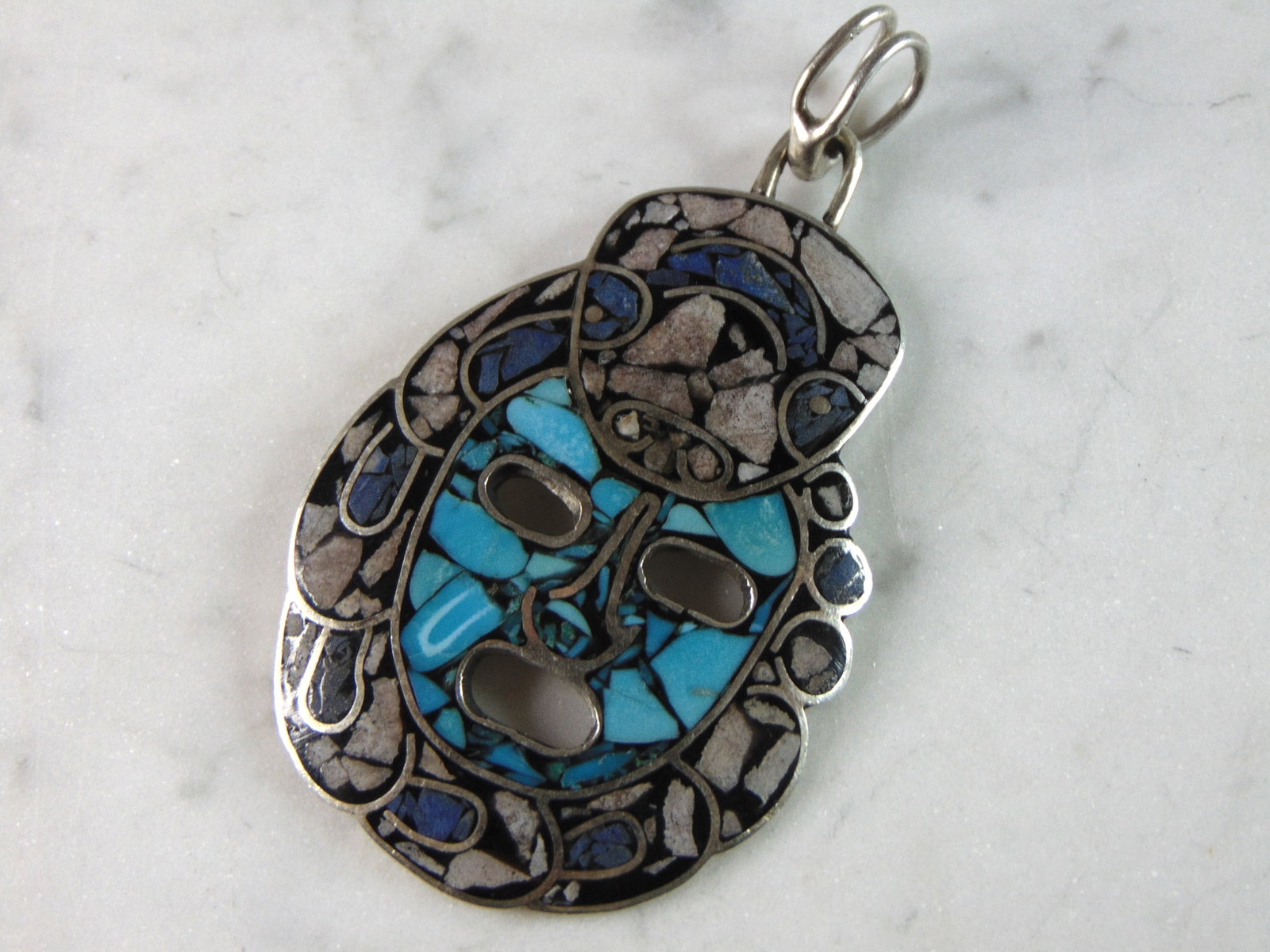 Womens Vintage Estate Sterling Silver Southwestern Turquoise Pendant: A WOMENS VINTAGE ESTATE STERLING SILVER SOUTHWESTERN TURQUOISE PENDANT. NOT SURE IF STONES ARE REAL OR MAN MADE. THE PENDANT WEIGHS 18.3g AND MEASURES 2 7/8" LONG BY 1 5/8" WIDE. MAKES A GREAT GIFT FO