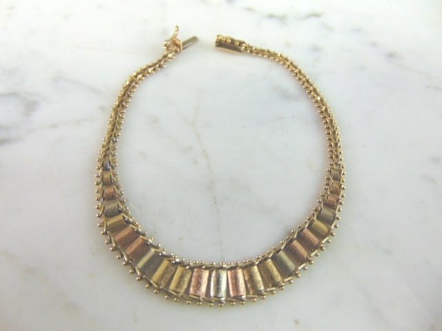 Womens Vintage Estate 14k Multi Tone Gold Bracelet: A WOMENS VINTAGE ESTATE 14K YELLOW, ROSE AND WHITE GOLD BRACELET. THE BRACELET MEASURES 7 1/2" LONG BY 5/16" WIDE AND WEIGHS 7.7g. MAKES A GREAT GIFT FOR THAT SOMEONE SPECIAL. BE SURE TO CHECK OUT SOM