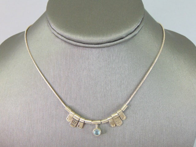 Womens Vintage Sterling Silver Modernist Necklace: A WOMENS VINTAGE ESTATE STERLING SILVER MODERNIST NECKLACE. NECKLACE MEASURES 16 1/2" LONG FROM THE CLASP AND 1/2" WIDE AND WEIGHS 10.0g. WOULD MAKE A LOVELY GIFT FOR THAT SOMEONE SPECIAL. ANY OTHER Q