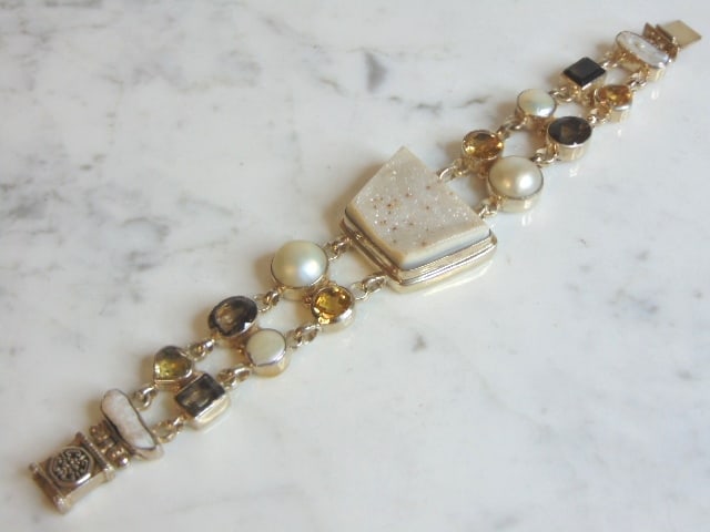 Womens Vintage Estate Sterling Silver Multi Stone Bracelet: FOR SALE IS A LOVELY VINTAGE ESTATE .925 STERLING SILVER MULTI STONE BRACELET. BRACELET MEASURES 8 1/4" LONG BY 1 1/2" WIDE AND WEIGHS 72.3g. NOT SURE IF STONES ARE NATURAL OR MAN MADE. THIS WOULD MAK