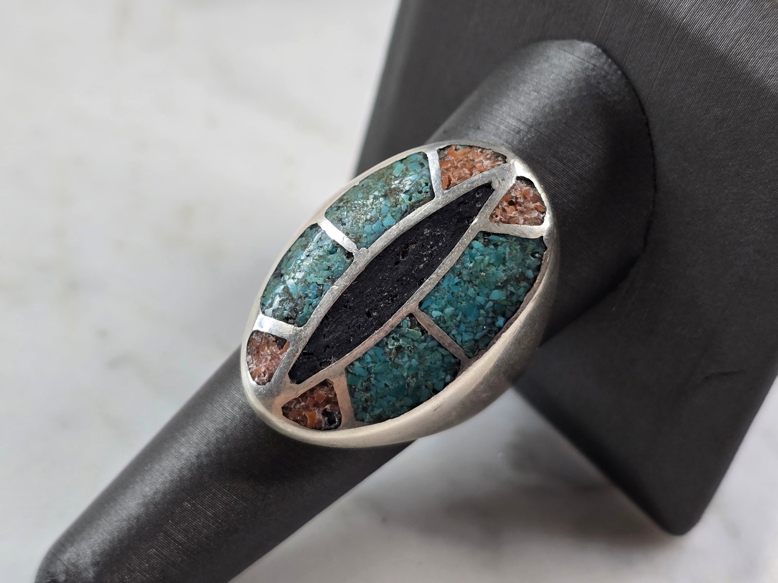 Mens Vintage Sterling Silver Southwestern Turquoise Coral Ring: A MENS VINTAGE ESTATE STERLING SILVER SOUTHWESTERN TURQUOISE & CORAL RING. THE RING IS A SIZE 9.5 AND WEIGHS 30.7g. RING MEASURES 1 1/4" LONG. RING IS NOT MARKED BUT IT HAS BEEN TESTED AND IS GUARANTE