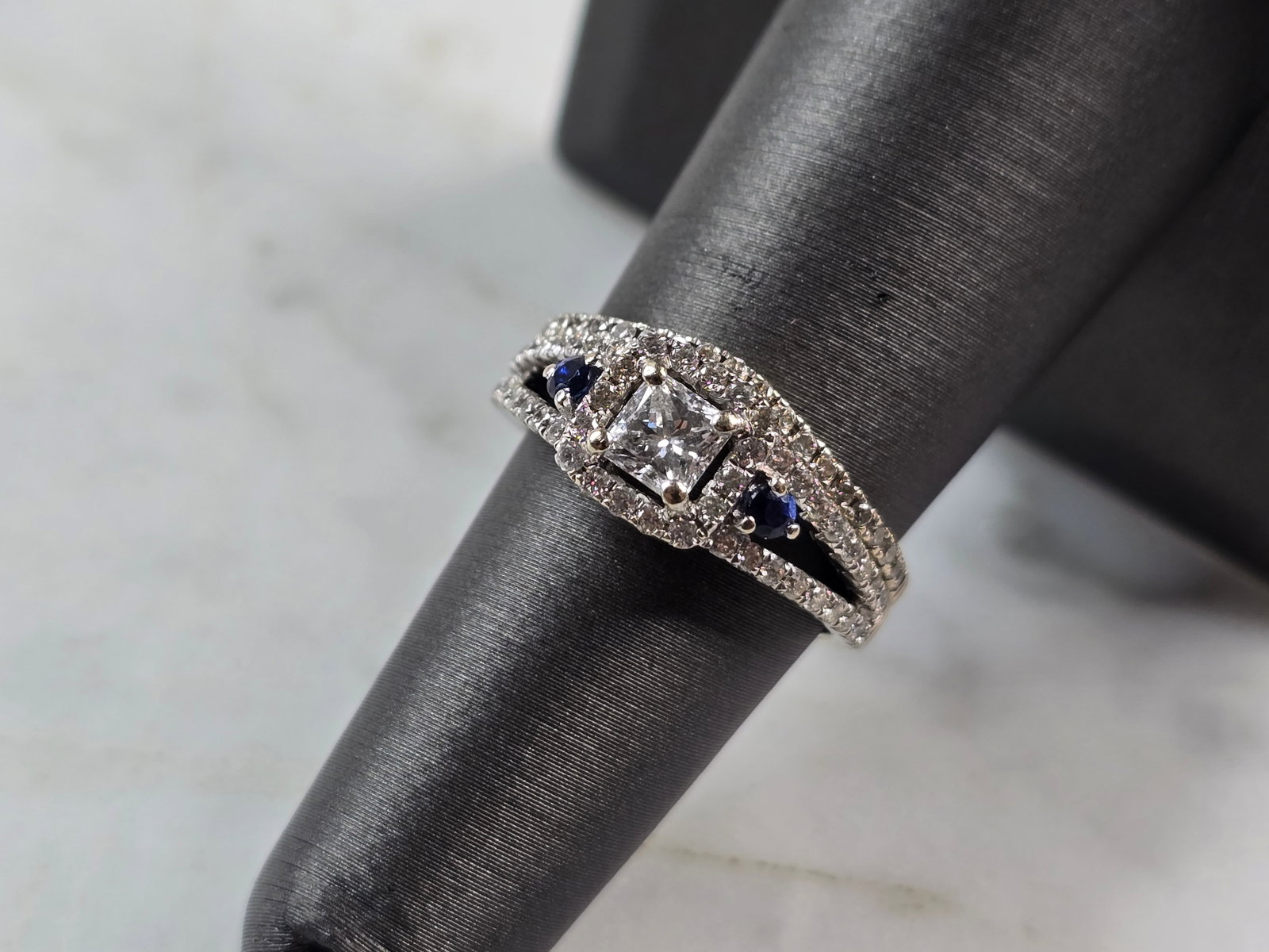 Womens Vintage Estate 14K White Gold Diamond Sapphire Ring Set: A WOMENS VINTAGE ESTATE 14K WHITE GOLD DIAMOND SAPPHIRE RING SET. THE RING IS A SIZE 6.25, AND WEIGHS 4.5g. THE WIDTH OF THE TWO TOGETHER IS 3/8". THE CENTER DIAMOND IS ABOUT 0.25cts, WITH 74 TINY ACC
