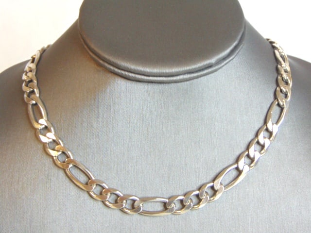 Vintage Sterling Silver Italian Chain Link Necklace: A VINTAGE STERLING SILVER NECKLACE STAMPED ITALY. THE TOTAL WEIGHT IS 55.6g. THE NECKLACE MEASURES ABOUT 22" WITH ITS CLASP, BY 3/8" WIDE. MAKES A GREAT GIFT FOR THAT SPECIAL SOMEONE. ANY QUESTIONS, P
