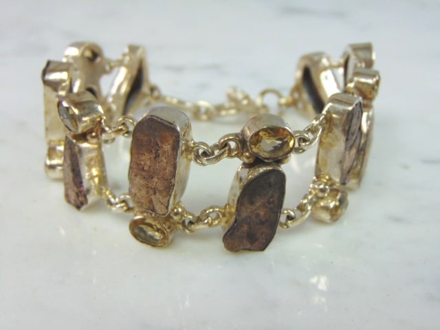 Womens Vintage Sterling Silver Modernist Bracelet: A LOVELY VINTAGE ESTATE STERLING SILVER MODERNIST BRACELET. NOT SURE OF THE STONES AND IF THEY ARE NATURAL OR MAN MADE. BRACELET MEASURES 9 1/2" LONG BY 1" WIDE AND WEIGHS 62.1g. THIS WOULD MAKE A LOV