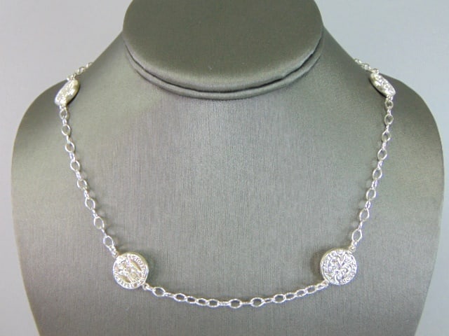 Womens Sterling Silver French Fleur de lis Necklace: A VERY NICE STERLING SILVER FRENCH FELUR DE LIS NECKLACE THAT WEIGHS 16.9g. THE NECKLACE MEASURES 23/4" LONG BY 1/2" WIDE. ANY QUESTIONS PLEASE DONT HESITATE TO ASK. BE SURE TO CHECK OUT SOME OF MY OT
