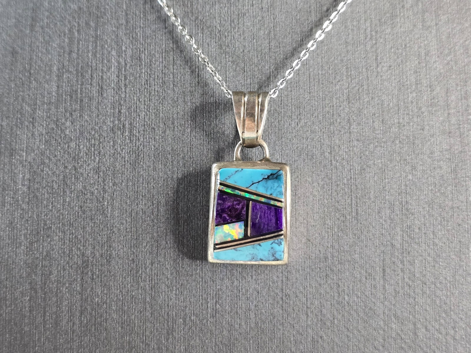 Womens Sterling Silver Cecil Ashley Native Turquoise Pendant Necklace: A WOMENS VINTAGE ESTATE STERLING SILVER SOUTHWESTERN NATIVE AMERICAN TURQUOISE & OPAL, WITH WHAT APPEARS TO BE SUGILITE INLAY PENDANT WITH NECKLACE. THE PENDANT WITH THE NECKLACE WEIGHS 6.7g. THE PEND