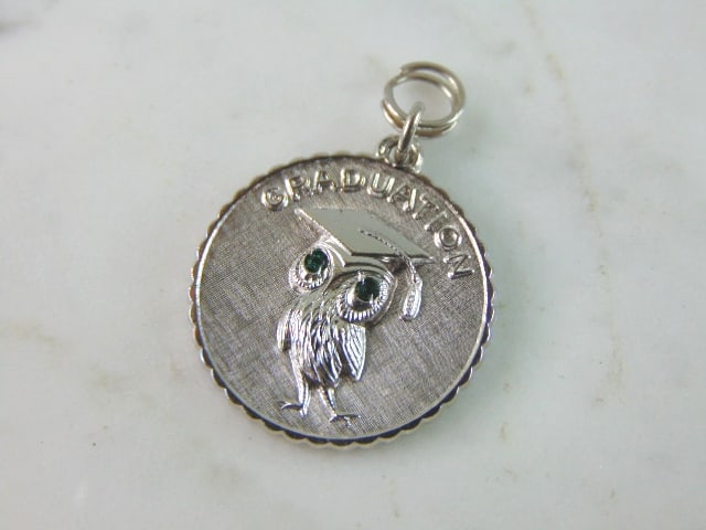 Womens Vintage Sterling Silver Owl Graduation Charm: A WOMENS VINTAGE ESTATE STERLING SILVER OWL GRADUATION CHARM. CHARM WEIGHS 6.6g AND MEASURES 1 1/4" LONG BY 1" WIDE. MAKES A GREAT GIFT FOR THAT SOMEONE SPECIAL. ANY QUESTIONS, PLEASE ASK. BE SURE TO 
