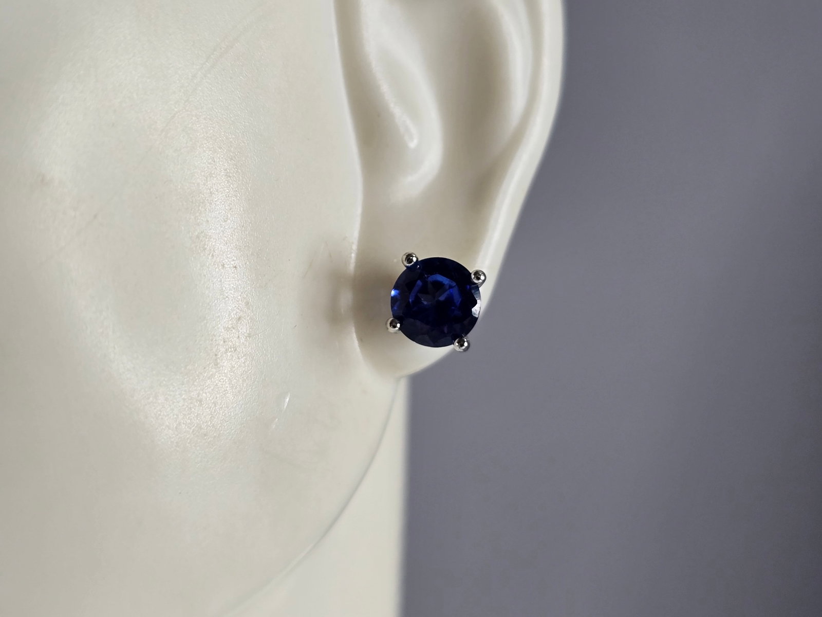 Womens Vintage Estate Sterling Silver Sapphire Colored Stud Earrings: A PAIR OF WOMENS STERLING SILVER SAPPHIRE COLORED EARRINGS THAT WEIGH 1.3g AND MEASURE 1/4" BY 1/4". ANY QUESTIONS, PLEASE DO NOT HESITATE TO ASK. BE SURE TO CHECK OUT SOME OF MY OTHER GREAT ITEMS UP 