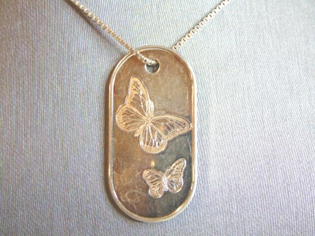 Womens Sterling Silver Necklace w/ Butterfly Pendant: A STERLING SILVER NECKLACE WITH BUTTERFLY PENDANT. THE NECKLACE MEASURES 24 1/4" LONG AND THE PENDANT MEASURES 1 3/4" LONG BY 7/8" WIDE. TOGETHER THEY WEIGH 14.9g. ANY QUESTIONS PLEASE DON'T HESITATE 