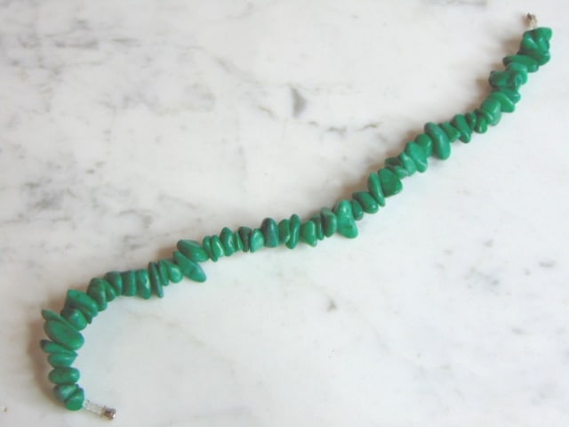 Womens Vintage Estate Turquoise Bracelet: A WOMENS VINTAGE TURQUOISE BRACELET. NOT SURE IF STONES ARE REAL OR MAN MADE. BRACELET MEASURES 10 3/8" LONG BY 1/2" WIDE AND WEIGHS 41.2g. WOULD MAKE A LOVELY GIFT FOR THAT SOMEONE SPECIAL. BE SURE T