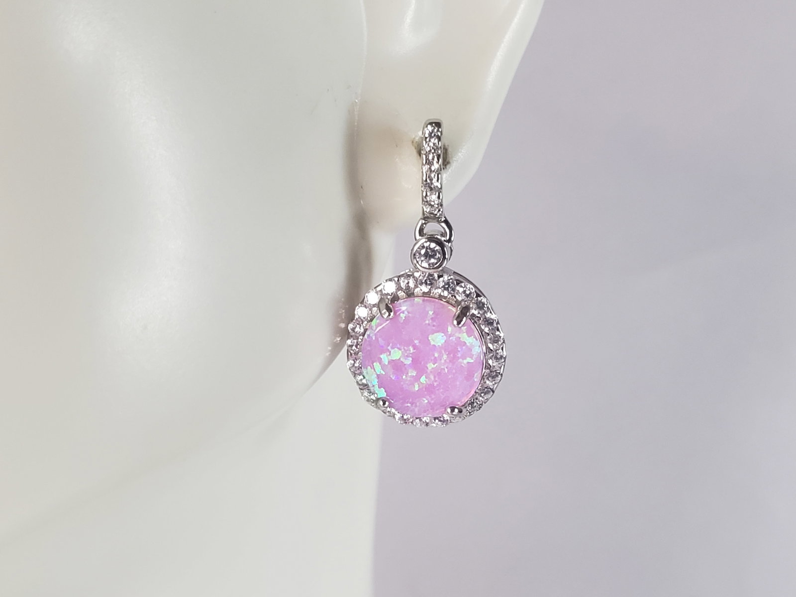 Womens Vintage Estate Sterling Silver Pink Opal Stone Earrings: A PAIR OF WOMENS STERLING SILVER OPAL COLORED EARRINGS THAT WEIGH 3.6g AND MEASURES 3/4" LONG BY 1/2" WIDE. NOT SURE IF STONES ARE REAL OR MAN MADE. ANY QUESTIONS, PLEASE DO NOT HESITATE TO ASK. BE SU