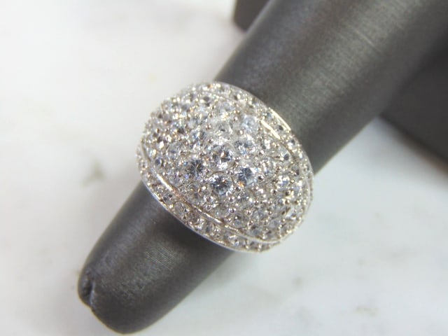 Womens Vintage Estate Sterling Silver CZ Ring: A WOMENS VINTAGE ESTATE STERLING SILVER CZ RING. THE RING SIZE IS A 4.75, AND WEIGHS 10.0g. THIS WOULD MAKE A NICE GIFT FOR THAT SOMEONE SPECIAL. ANY QUESTIONS PLEASE DO NOT HESITATE TO ASK. BE SURE T