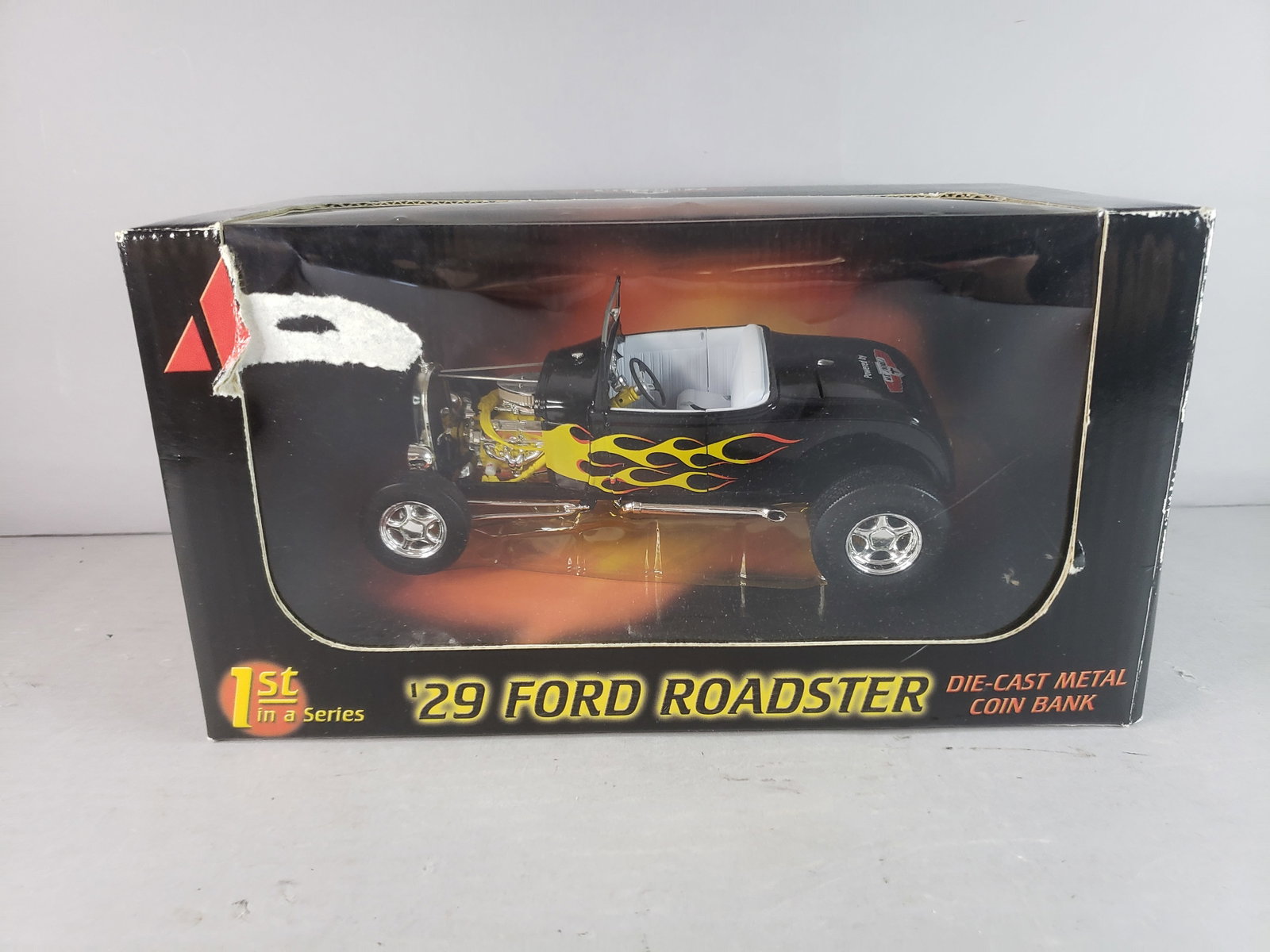 Ace Stores 1st In A Series 1929 Ford Roadster Diecast Metal Coin Bank: ACE STORES 1ST IN A SERIES 1929 FORD ROADSTER DIECAST METAL COIN BANK THAT IS IN VERY GOOD CONDITION. BOX HAS SOME BLEMISHES AS SEEN IN THE PICTURES, WOULD BE BUYING AS IS. SHIPPING AND HANDLING IS $2
