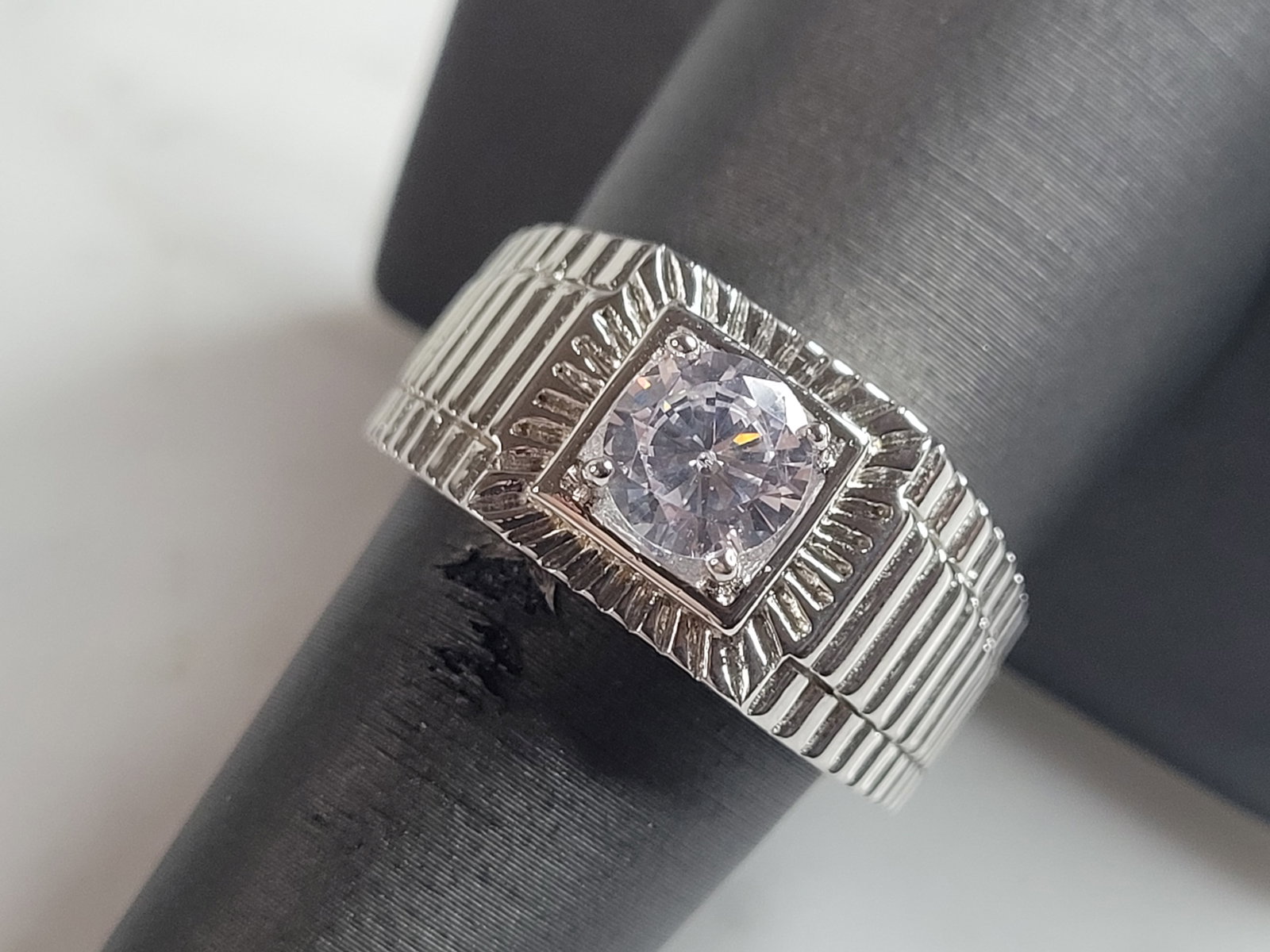 Mens Estate Sterling Silver CZ Ring: A MENS ESTATE STERLING SILVER CZ RING. THE RING IS A SIZE 9.0 AND WEIGHS 9.8g. THE WIDTH OF THE RING IS ABOUT 1/2". THE RING MAKES A BEAUTIFUL, IMPRESSIVE GIFT FOR THAT SOMEONE SPECIAL. ANY QUESTIONS,