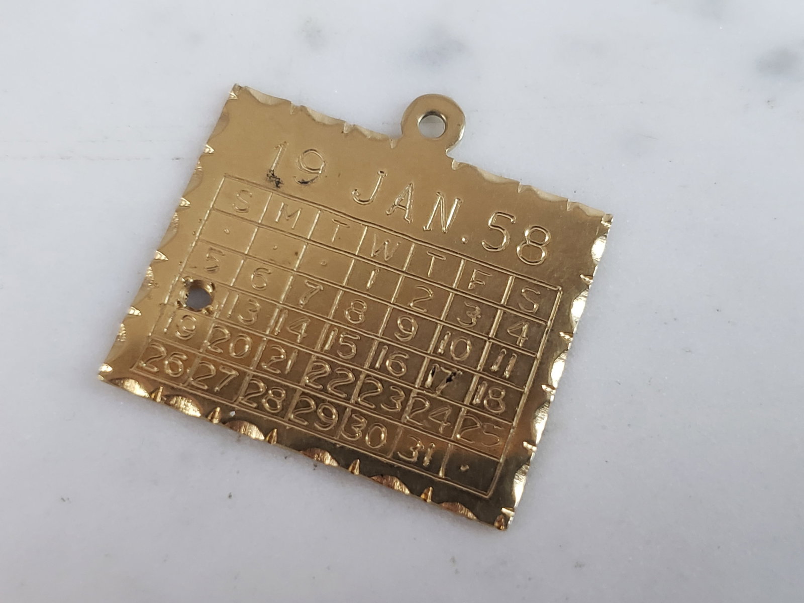 Womens Vintage Estate 14K Yellow Gold Birthday Pendant: A WOMENS VINTAGE ESTATE 14k GOLD BIRTHDAY PENDANT FOR JANUARY 12TH, 1958. PENDANT WEIGHS 4.6g, AND MEASURES 1" LONG BY 1 " WIDE. MAKES A GREAT GIFT FOR THAT SOMEONE SPECIAL. ANY QUESTIONS, PLEASE ASK.