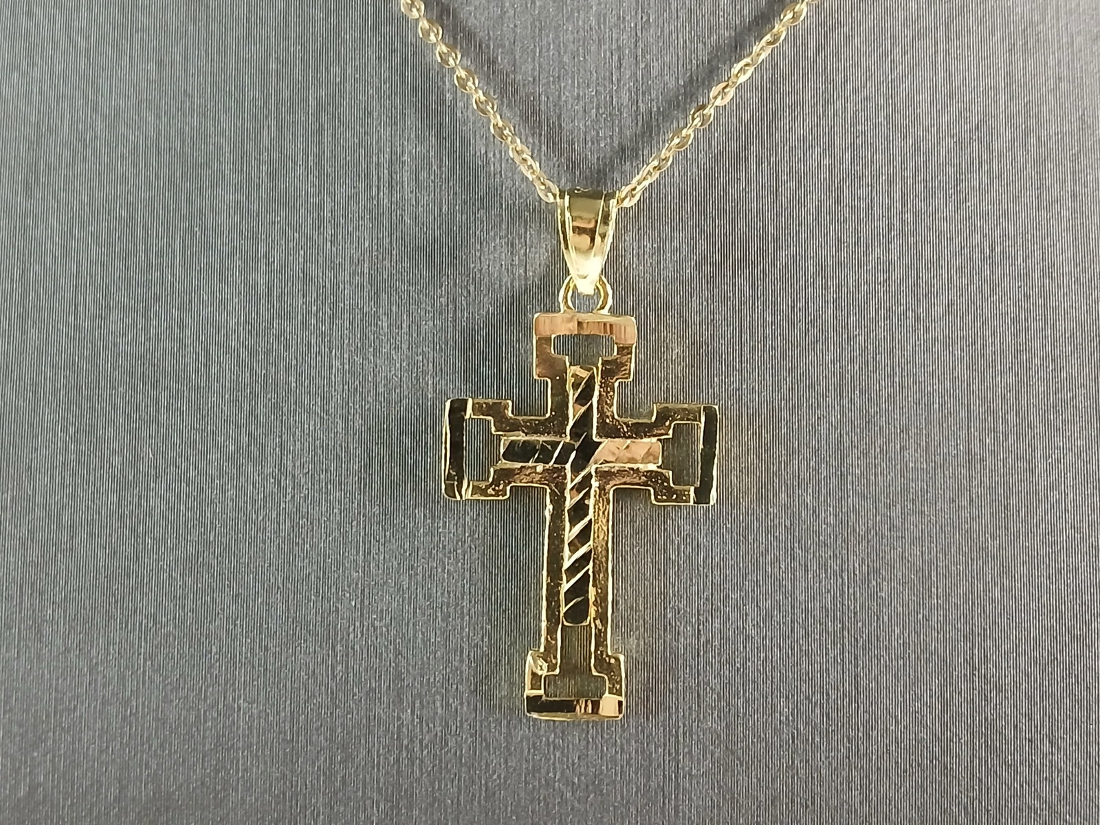 Womens Sterling Silver Gold Tone Religious Cross Necklace: A VERY NICE STERLING SILVER GOLD TONE RELIGIOUS CROSS NECKLACE THAT WEIGHS 4.1g. THE NECKLACE MEASURES 18" LONG AND THE PENDANT MEASURES 1 1/4" LONG BY 3/4" WIDE. ANY QUESTIONS PLEASE DONT HESITATE TO