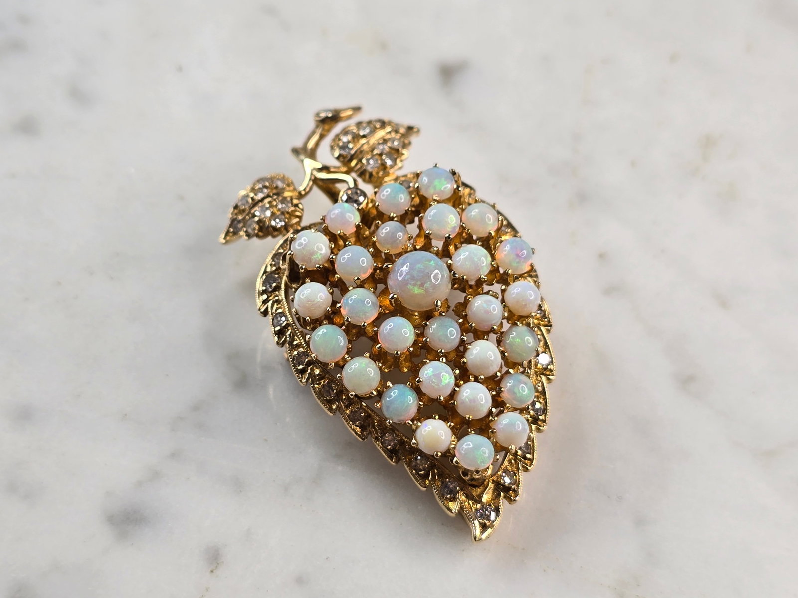 Womens Vintage Estate 14K Yellow Gold Opal & Diamond Brooch Pendant: A WOMENS VINTAGE ESTATE 14K YELLOW GOLD DIAMOND & OPAL BROOCH PENDANT. THE BROOCH/PENDANT WEIGHS 14.9g, AND MEASURES ABOUT 2 7/8" BY 1". THERE ARE 44 SMALL DIAMONDS IN THIS PIECE. BROOCH IS STAMPED 14