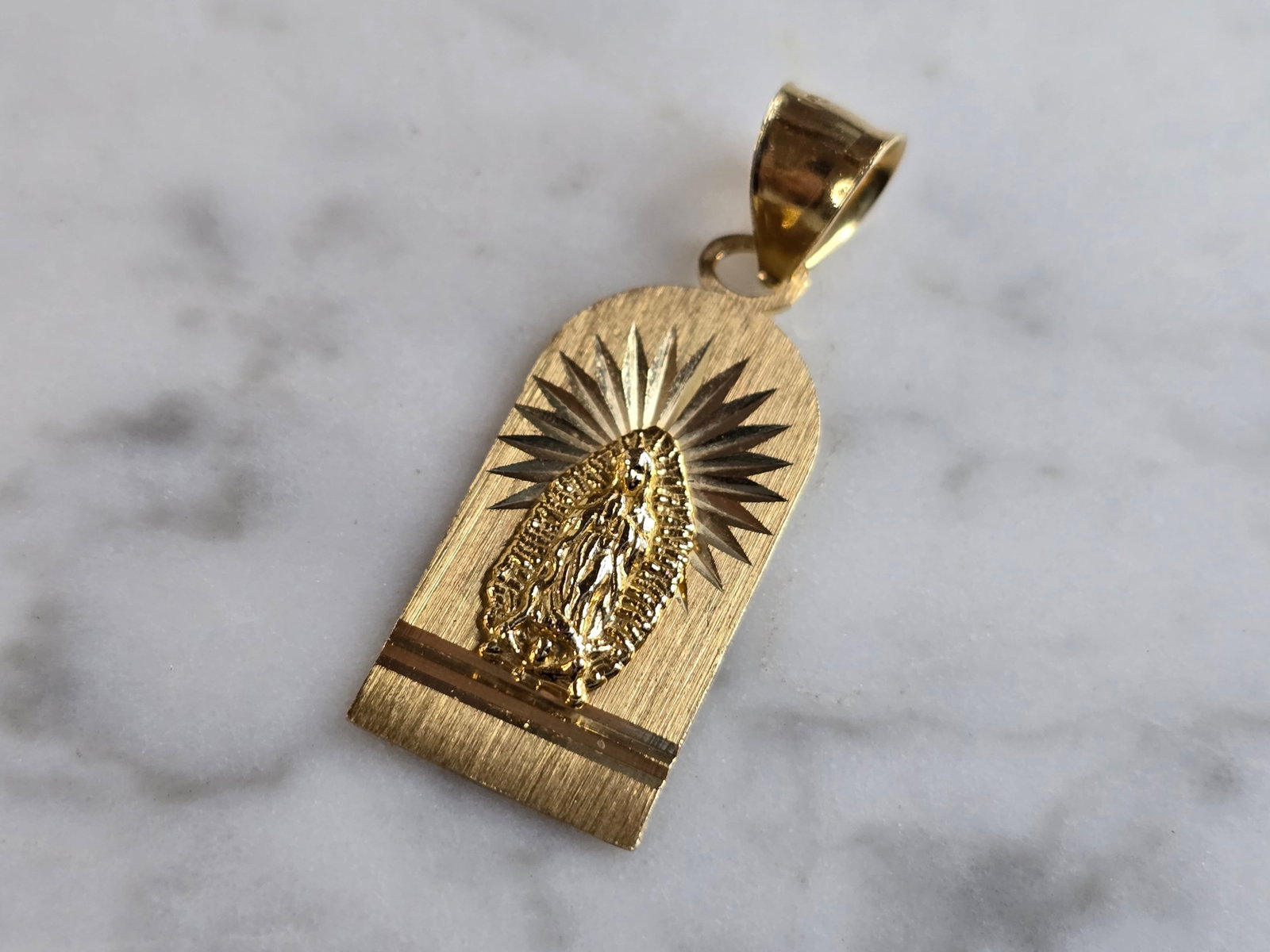 Vintage Estate 14K Yellow Gold Religious Catholic Pendant: A VINTAGE ESTATE 14K YELLOW GOLD RELIGIOUS VIRGIN MARY PENDANT THAT WEIGHS 2.4g, AND MEASURES ABOUT 1 1/4" LONG BY 1/2" WIDE. MAKES A GREAT GIFT FOR THAT SPECIAL SOMEONE.