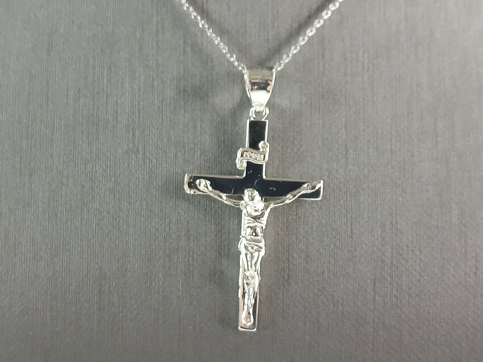 Womens Sterling Silver Religious Cross Pendant Necklace: A VERY NICE STERLING SILVER RELIGIOUS CROSS PENDANT WITH NECKLACE THAT WEIGHS 4.2g. THE PENDANT MEASURES 1 3/4" LONG BY 1" WIDE. THE NECKLACE MEASURES 18" LONG. ANY QUESTIONS PLEASE DONT HESITATE TO A
