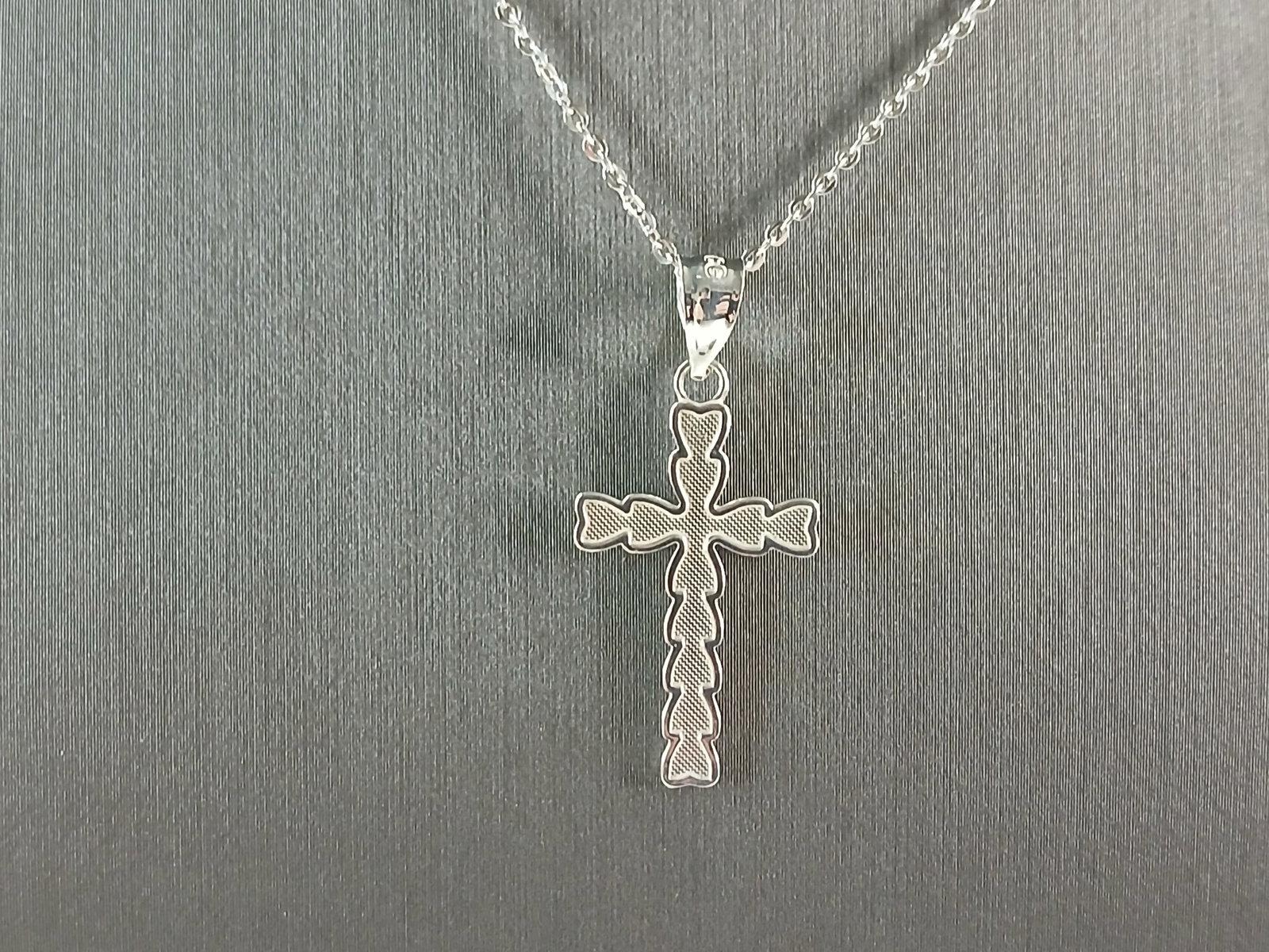 Womens Sterling Silver Religious Cross Pendant Necklace: A VERY NICE STERLING SILVER RELIGIOUS CROSS PENDANT WITH NECKLACE THAT WEIGHS 2.3g. THE PENDANT MEASURES 1 1/8" LONG BY 1/2" WIDE. THE NECKLACE MEASURES 18" LONG. ANY QUESTIONS PLEASE DONT HESITATE TO
