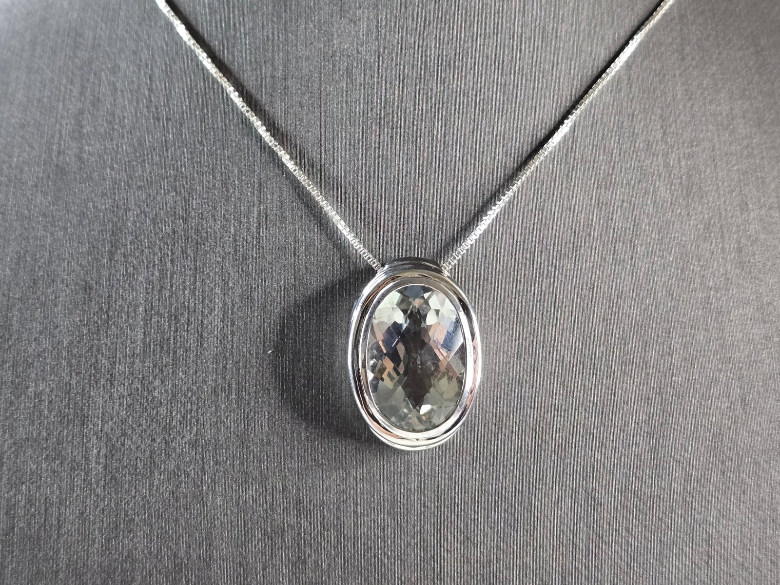 Womens Vintage Estate Sterling Silver CZ Modernist Pendant Necklace: A WOMENS VINTAGE ESTATE STERLING SILVER MODERNIST CZ PENDANT WITH NECKLACE. TOGETHER THEY WEIGH 10.1g. THE PENDANT MEASURES 7/8" LONG BY 5/8" WIDE. THE NECKLACE MEASURES 18" LONG. MAKES A GREAT GIFT F