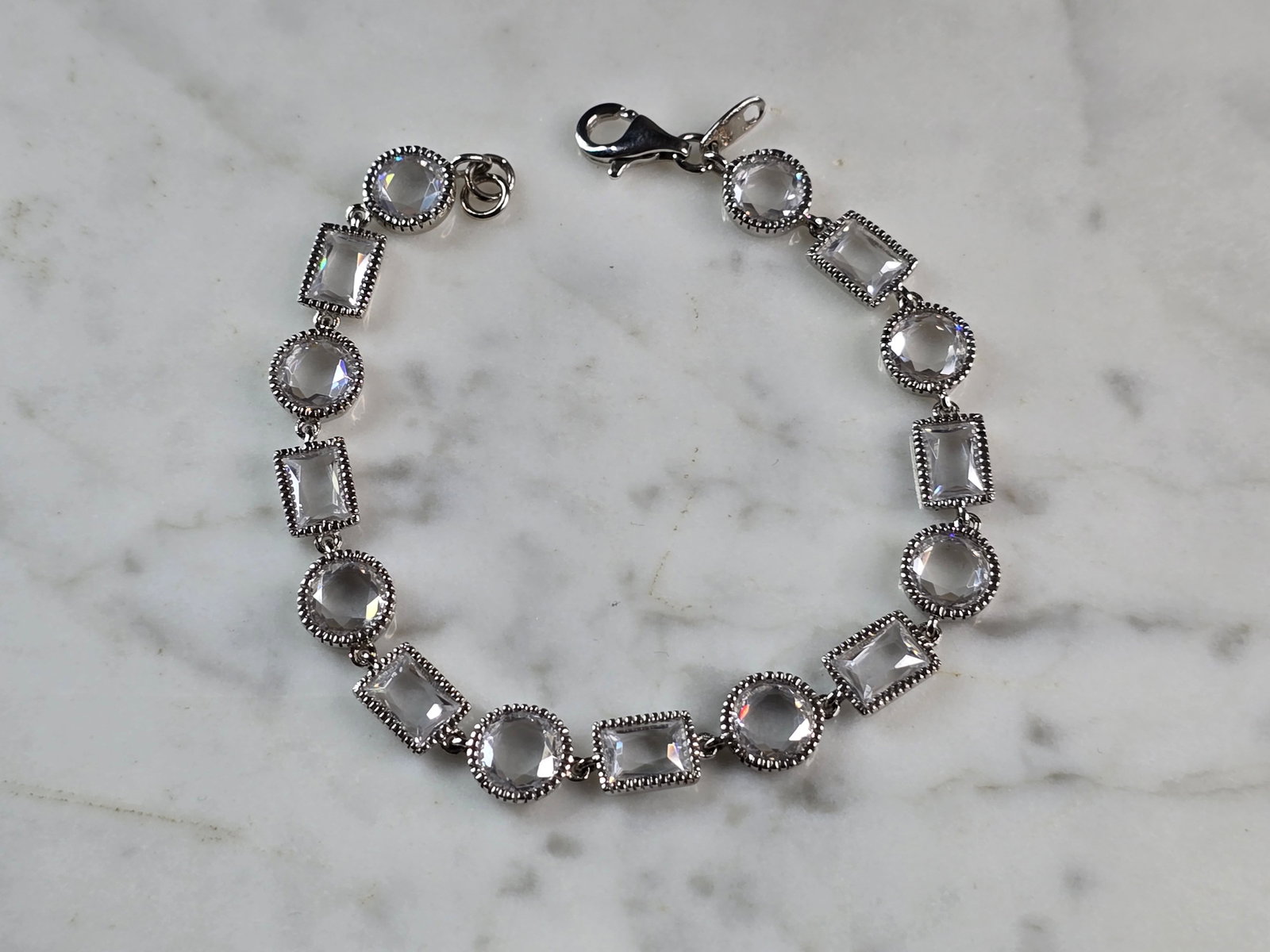 Womens Vintage Estate Sterling Silver Modernist Bracelet: A WOMENS VINTAGE ESTATE STERLING SILVER MODERNIST TENNIS BRACELET. THE BRACELET MEASURES 7 1/8" LONG BY 3/8" WIDE, AND WEIGHS 12.4g. WOULD MAKE A GREAT GIFT FOR SOMEONE SPECIAL. ANY QUESTIONS PLEASE D