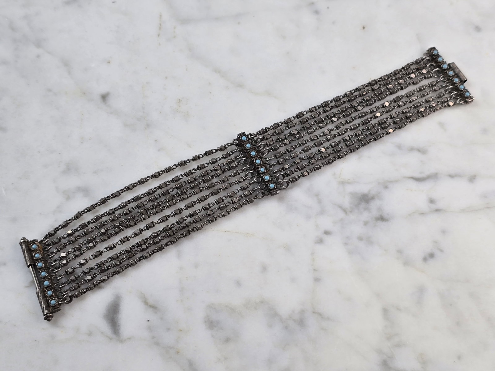 Womens Vintage Estate Coin Silver ? Turquoise Southwestern Bracelet: A WOMENS VINTAGE ESTATE SOUTHWESTERN ZUNI STYLE BRACELET BELIEVED TO ME MADE OF COIN SILVER. BRACELET MEASURES 7" LONG BY 1" WIDE AND WEIGHS 28.2g. ANY CONCERNS OF THE PIN SLIDING OUT, IT DOES NOT. ST