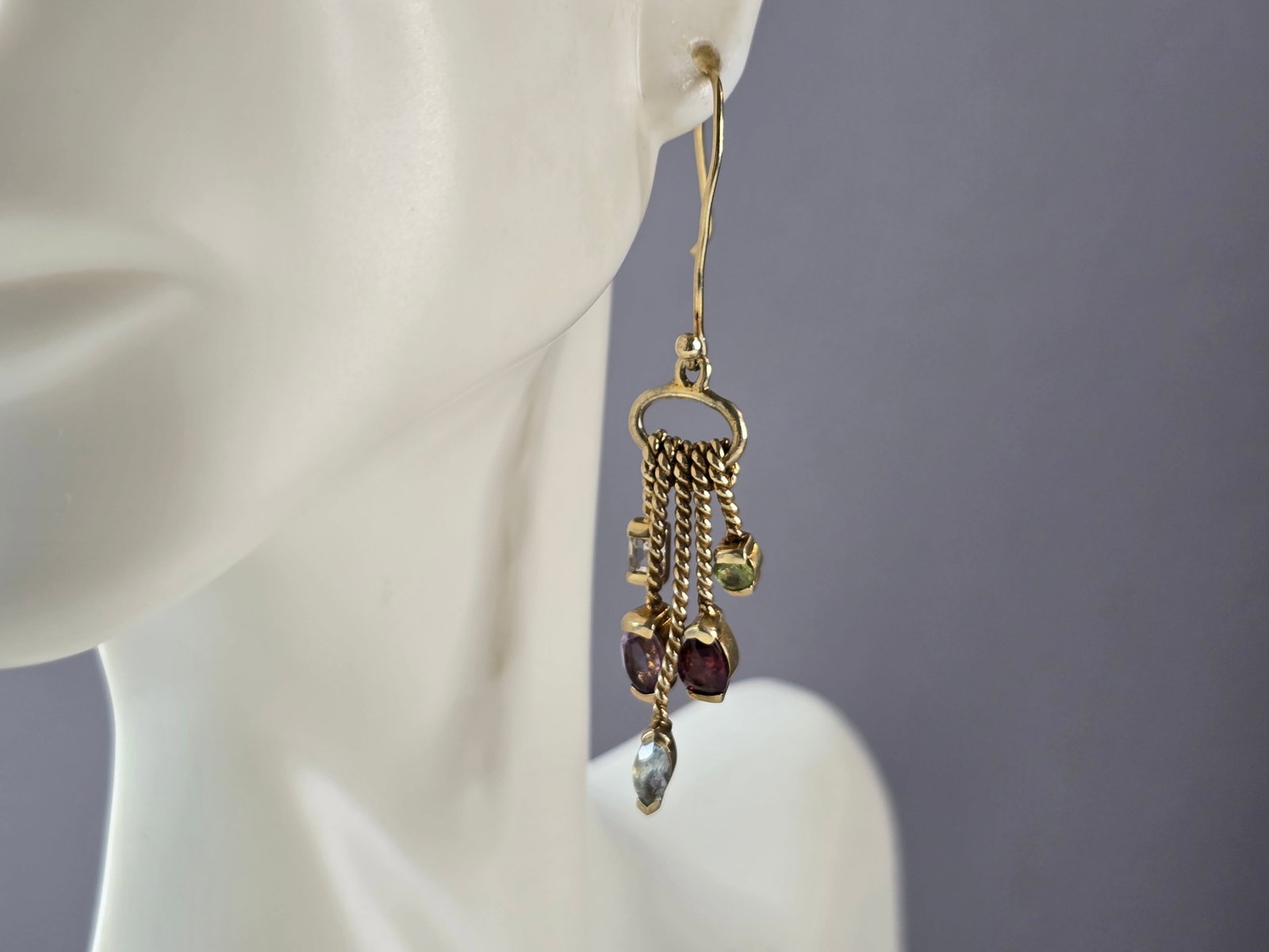 Womens Sterling Silver Gold Tone Modernist Multi Stone Earrings: A PAIR OF WOMENS STERLING SILVER GOLD TONE MODERNIST MULTI STONE COLORED EARRINGS THAT WEIGH 6.4g AND MEASURES 2" LONG BY 1/2" WIDE. NOT SURE IF STONES ARE NATURAL OR MAN MADE. ANY QUESTIONS, PLEASE D