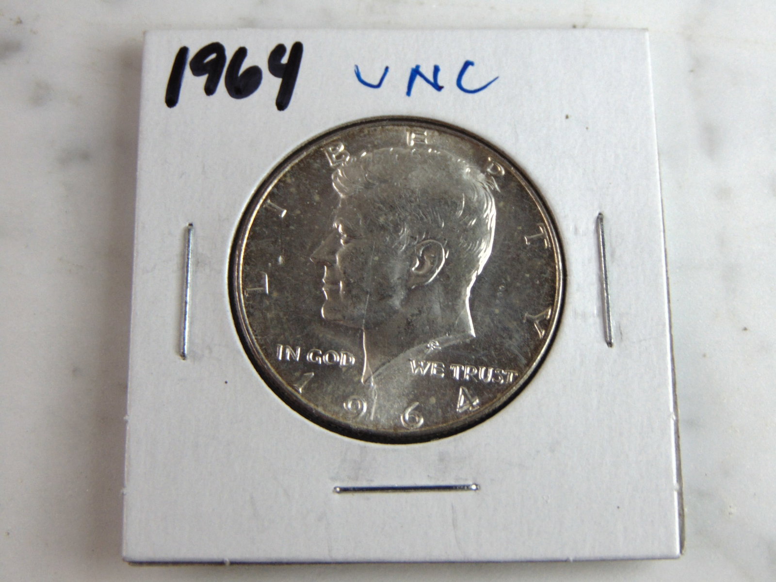 1964 Kennedy Half Dollar Coin: FOR SALE IS THIS 1964 KENNEDY HALF DOLLAR COIN. WE ARE NOT COIN EXPERTS WHEN IT COMES TO PROPER GRADING. PICTURES SHOULD BE CLEAR ENOUGH TO SEE ANY KIND OF BLEMISHES. BUYING AS IS. WOULD MAKE A GREAT 