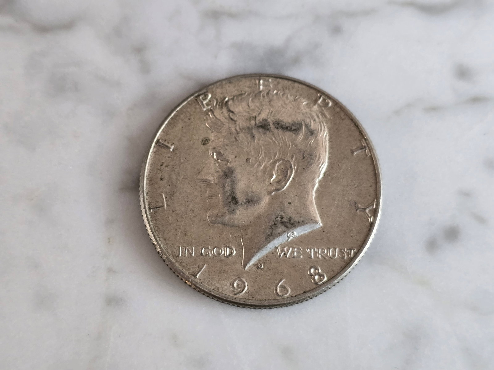 1968 Kennedy Half Dollar Coin: FOR SALE IS THIS 1968 KENNEDY HALF DOLLAR COIN. WE ARE NOT COIN EXPERTS WHEN IT COMES TO PROPER GRADING. PICTURES SHOULD BE CLEAR ENOUGH TO SEE ANY KIND OF BLEMISHES. BUYING AS IS. WOULD MAKE A GREAT 