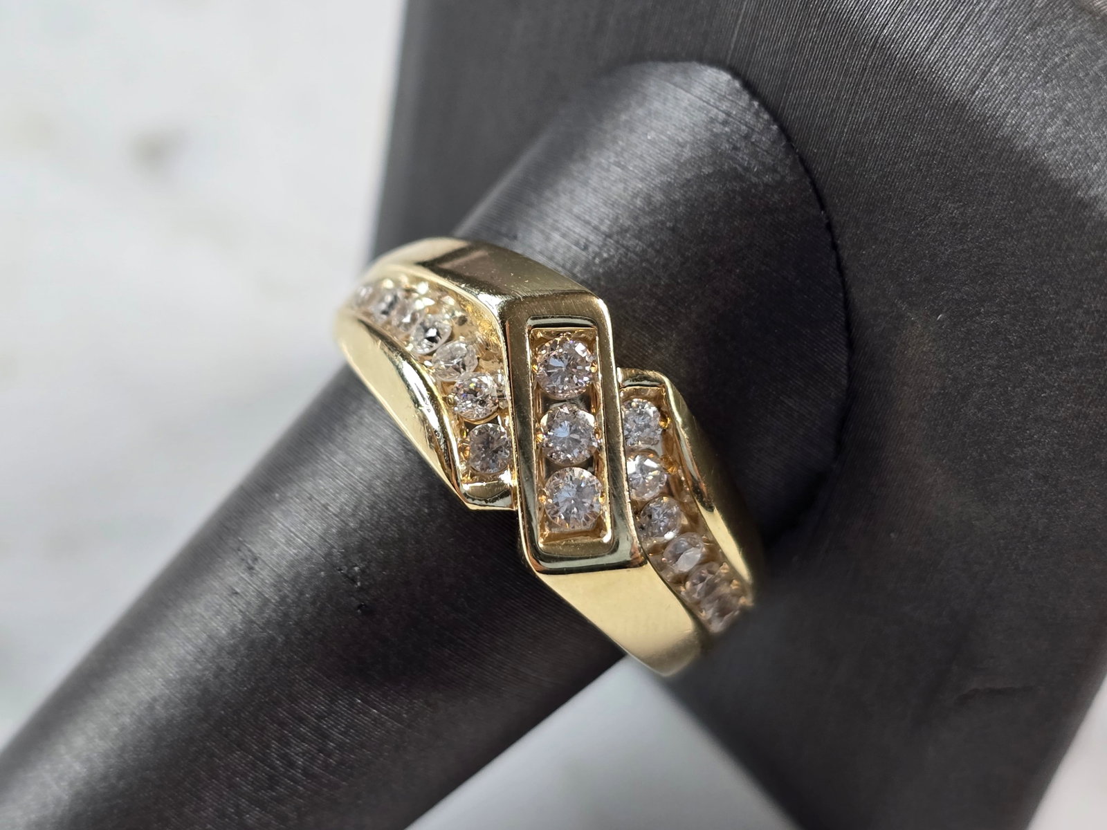 Mens Vintage Estate 14K Yellow Gold Frederick Goldman Diamond Ring: A MENS VINTAGE ESTATE 14K YELLOW GOLD DIAMOND RING MADE BY FREDERICK GOLDMAN. RING HAS ABOUT 0.57cts OF DIAMONDS. THE TOTAL WEIGHT IS 9.1g, AND IS A SIZE 11.75. THE WIDTH OF THE RING IS 3/8". ANY QUES