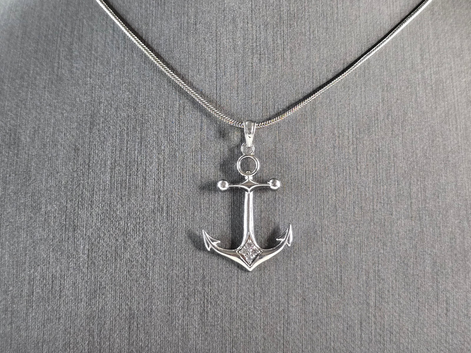 Vintage Estate Sterling Silver Maritime Anchor Pendant Necklace: A VERY NICE STERLING SILVER MARITIME ANCHOR PENDANT WITH NECKLACE. TOGETHER THEY WEIGH 5.0g. THE PENDANT MEASURES 1 1/4" BY 3/4". THE NECKLACE MEASURES 18 3/4" LONG. ANY QUESTIONS PLEASE DONT HESITATE
