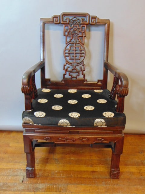 Decorative Vintage Chinese Rosewood Side Arm Chair: A beautiful vintage Chinese side chair that is believed to made of rosewood or mahogany. Chair measures 36 3/4" tall by 22 1/4" wide by 19 1/4" deep. Condition looks very good. Sorry no shipping on th