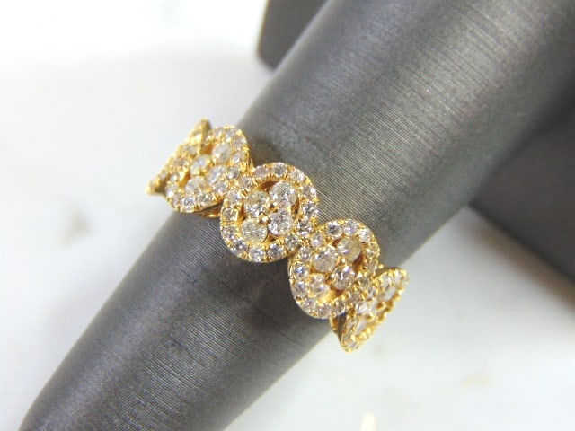 Women's 14K Yellow Gold Diamond Ring: FOR SALE IS THIS 14K YELLOW GOLD DIAMOND RING WITH ABOUT .52cts OF DIAMONDS IN IT. THE RING WEIGHS 3.9g. THE SIZE OF THE RING IS A 6.25. THIS MAKES A LOVELY GIFT FOR THAT SOMEONE SPECIAL. ANY QUESTION