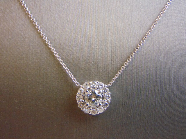 Womens 14K White Gold & Diamond Necklace Pendant: FOR SALE IS A VINTAGE ESTATE 14K WHITE GOLD & DIAMOND NECKLACE. THE NECKLACE MEASURES 18 1/4" LONG BY 3/8" WIDE AND WEIGHS 3.5g. THERE ARE APPROXIMATELY 1.2cts OF DIAMONDS. THE CENTER DIAMOND IS ABOUT