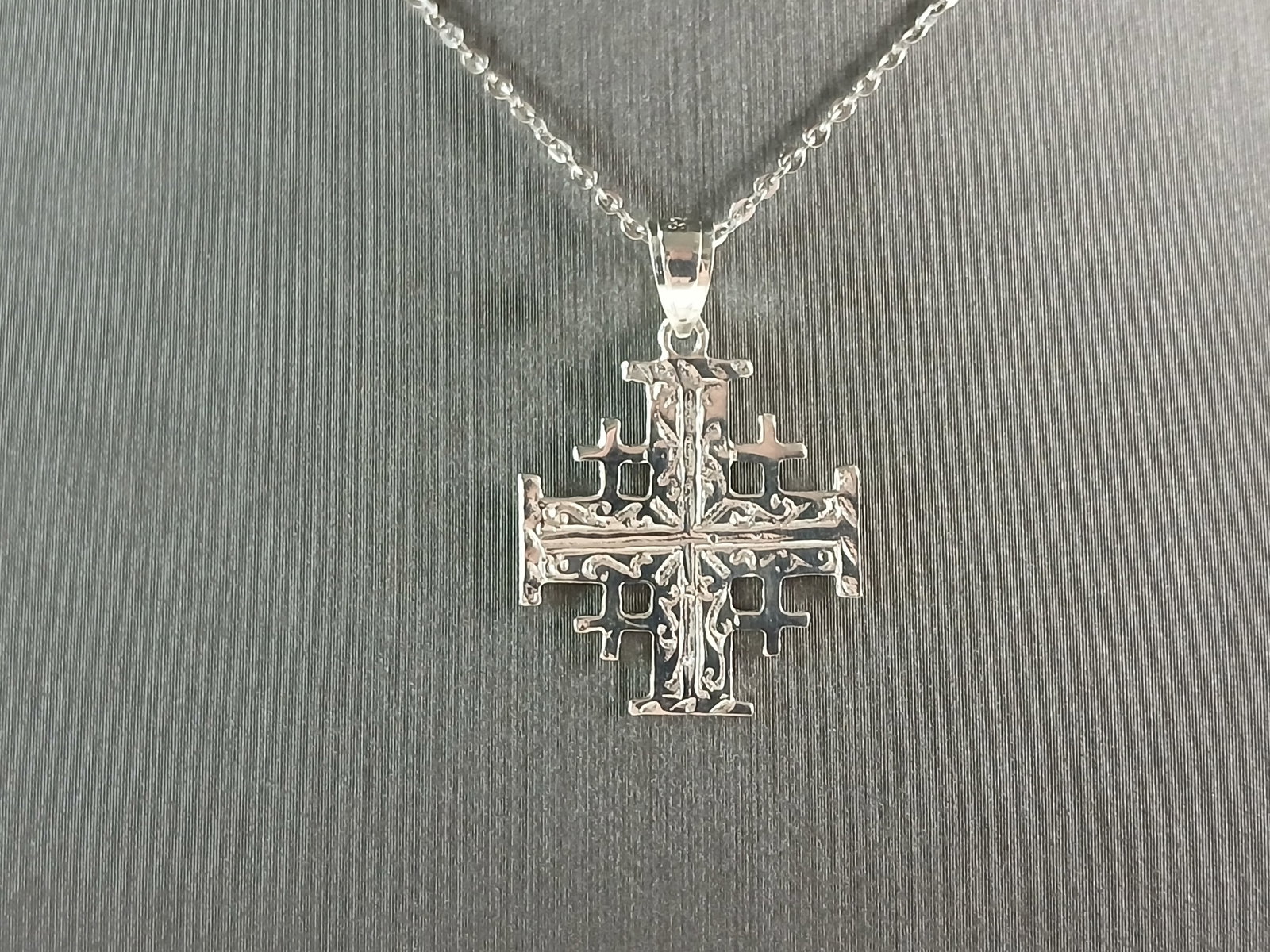 Womens Sterling Silver Religious Jerusalem Cross Pendant Necklace: A WOMENS STERLING SILVER RELGIOUS JERUSALEM CROSS PENDANT WITH NECKLACE . THE TOTAL WEIGHT IS 3.2g. THE PENDANT MEASURES 1" LONG BY 3/4" WIDE. THE NECKLACE MEASURES 18" LONG AND IS ADJUSTABLE TO 16" L