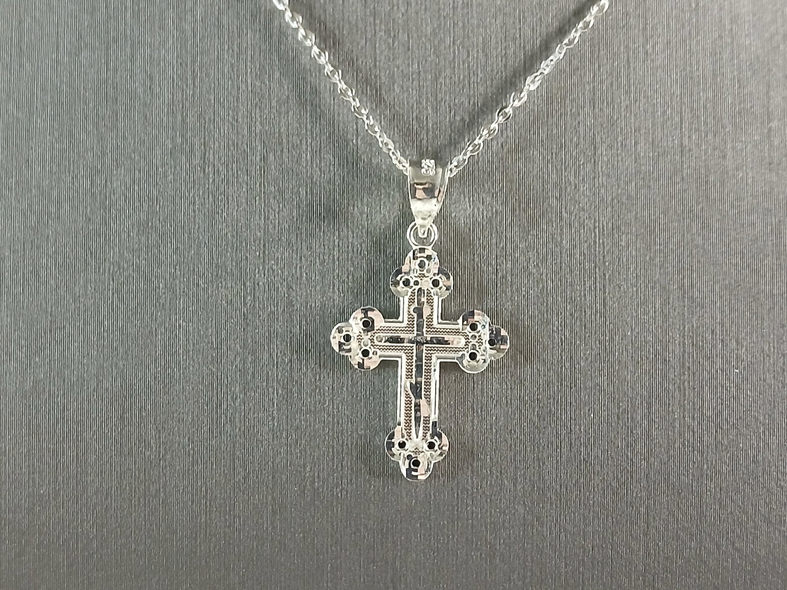 Womens Sterling Silver Religious Cross Pendant Necklace: A VERY NICE STERLING SILVER RELIGIOUS CROSS PENDANT WITH NECKLACE THAT WEIGHS 2.7g. THE PENDANT MEASURES 1 1/8" LONG BY 5/8" WIDE. THE NECKLACE MEASURES 18" LONG. ANY QUESTIONS PLEASE DONT HESITATE TO