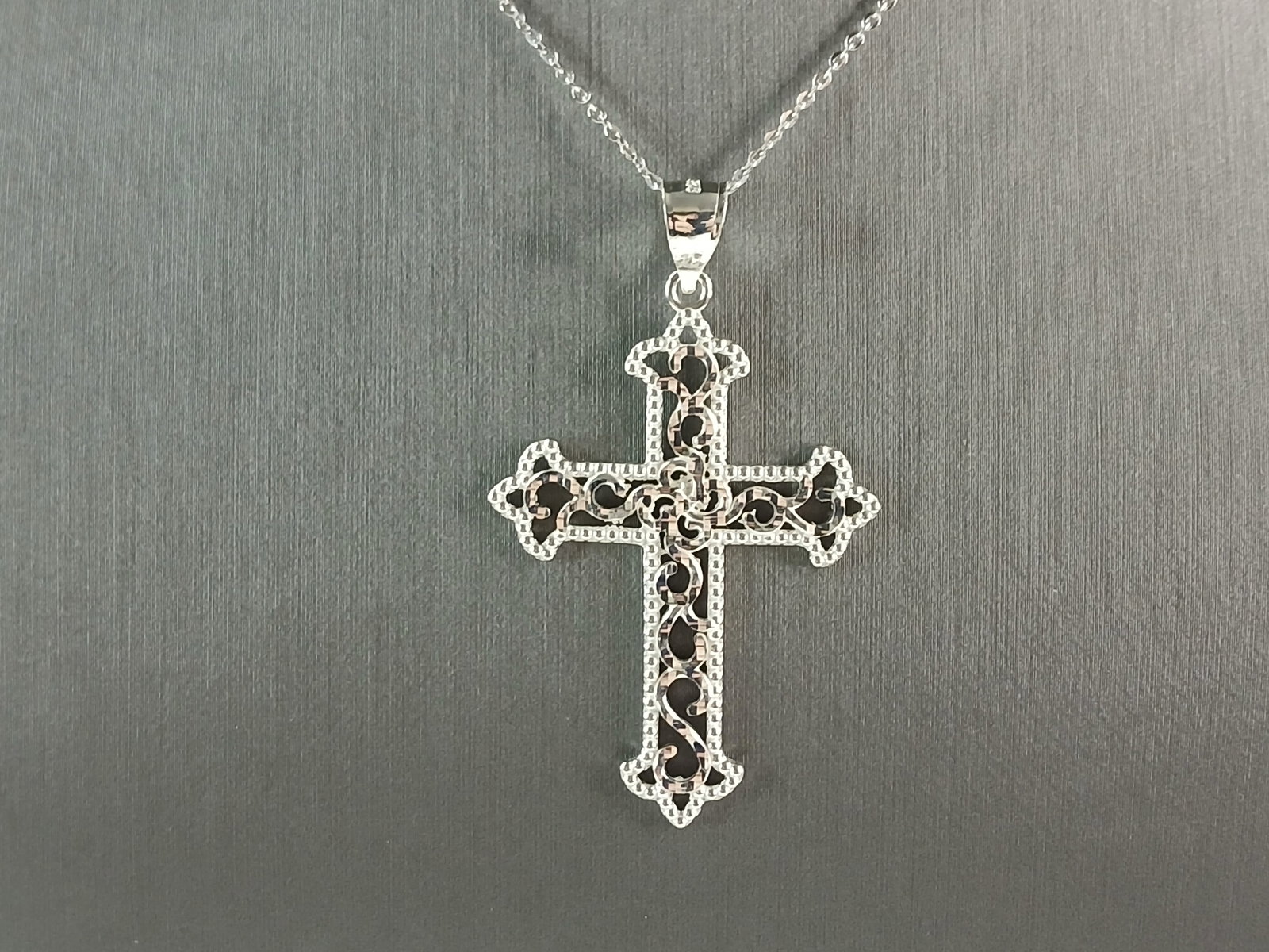 Womens Sterling Silver Religious Cross Pendant Necklace: A VERY NICE STERLING SILVER RELIGIOUS CROSS PENDANT WITH NECKLACE THAT WEIGHS 5.2g. THE PENDANT MEASURES 2" LONG BY 1 1/4" WIDE. THE NECKLACE MEASURES 18" LONG. ANY QUESTIONS PLEASE DONT HESITATE TO A