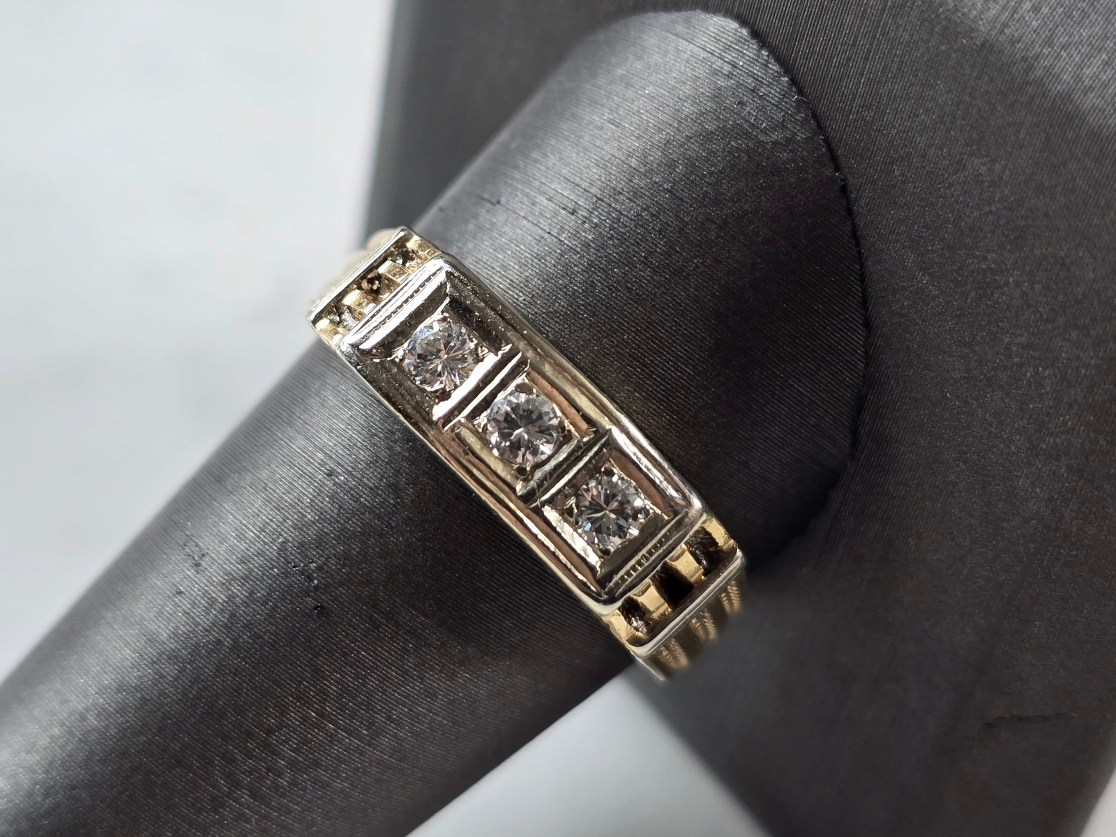 Mens Vintage Estate 14K Yellow Gold Diamond Ring: A MENS VINTAGE 14K YELLOW GOLD DIAMOND RING. RING HAS ABOUT .15cts OF DIAMONDS. THE TOTAL WEIGHT IS 6.7g, AND IS A SIZE 11.25. RING IS ABOUT 1/4" WIDE. RING IS MARKED, BUT IT DOES HAVE SOME PERSONALIZ