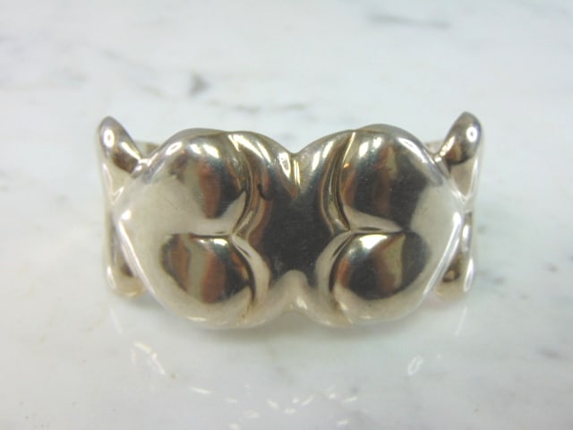 Womens Vintage Sterling Silver Heart Cuff Bracelet: A WONDERFUL WOMENS VINTAGE ESTATE STERLING SILVER HEART CUFF BRACELET. THE BRACELET WEIGHS 49.7g AND IS ABOUT 1 1/4" WIDE. THE CIRCUMFERENCE WITH THE GAP IS 5 1/2". ANY QUESTIONS PLEASE DO NOT HESITAT