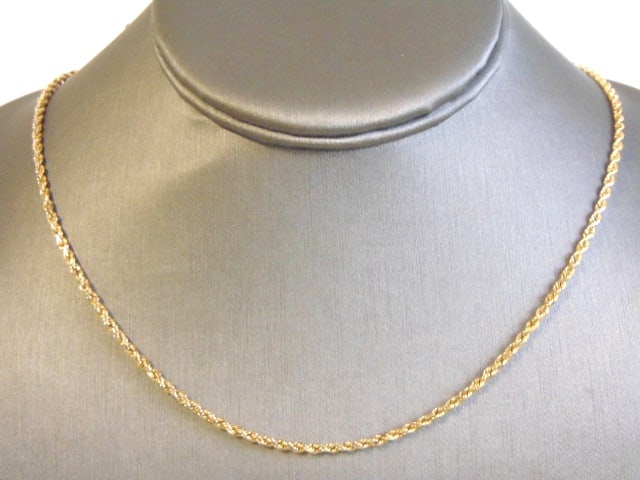 Vintage Estate 14K Yellow Gold Rope Chain Necklace: FOR SALE IS THIS LOVELY VINTAGE ESTATE HEAVY 14K GOLD ROPE CHAIN NECKLACE. THE WEIGHT OF THE NECKLACE IS 9.0g. THE NECKLACE MEASURES 19" LONG WHEN CLASPED. MAKES A GREAT GIFT FOR THAT SPECIAL SOMEONE.