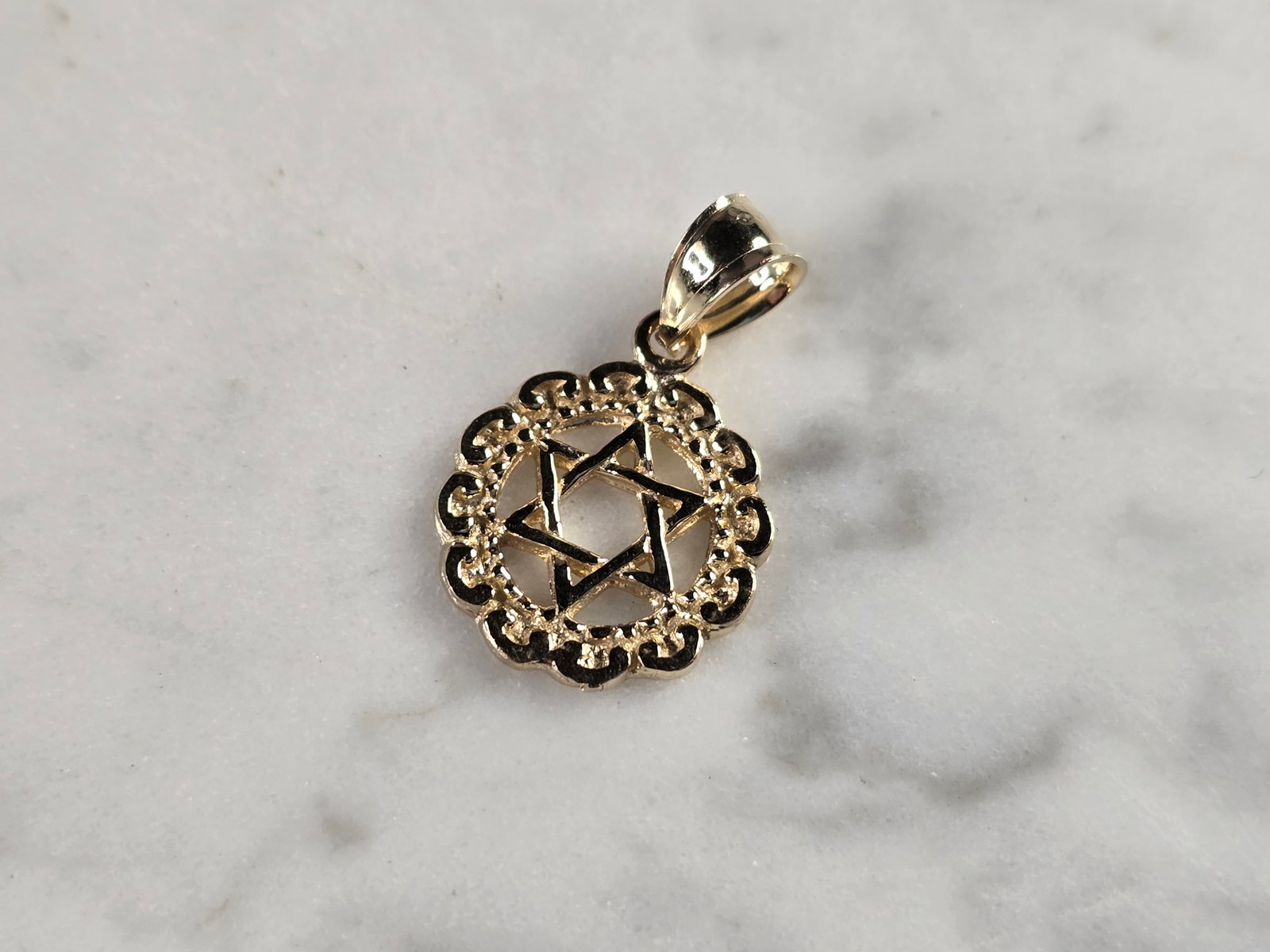 14K Gold Jewish Judaica Star of David Charm Pendant: A WOMENS 14K YELLOW GOLD STAR OF DAVID PENDANT. THE PENDANT WEIGHS 1.4g, AND MEASURES 7/8" LONG BY 1/2" WIDE. MAKES A GREAT GIFT FOR THAT SOMEONE SPECIAL. ANY QUESTIONS, PLEASE ASK. BE SURE TO CHECK O
