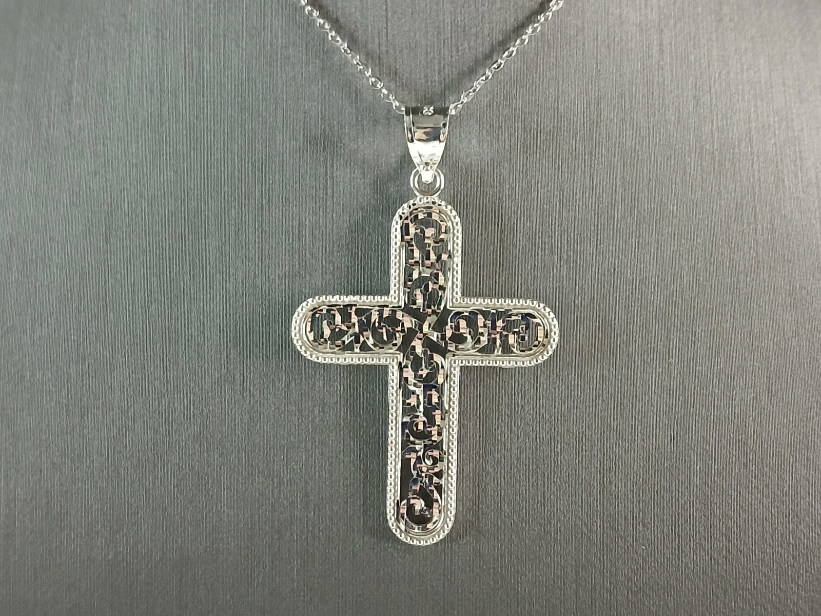 Womens Sterling Silver Religious Cross Pendant Necklace: A VERY NICE STERLING SILVER RELIGIOUS CROSS NECKLACE THAT WEIGHS 5.1g. THE PENDANT MEASURES 2" LONG BY 1 1/4" WIDE. THE NECKLACE MEASURES 18" LONG AND IS ADJUSTABLE TO 16" LONG. ANY QUESTIONS PLEASE D