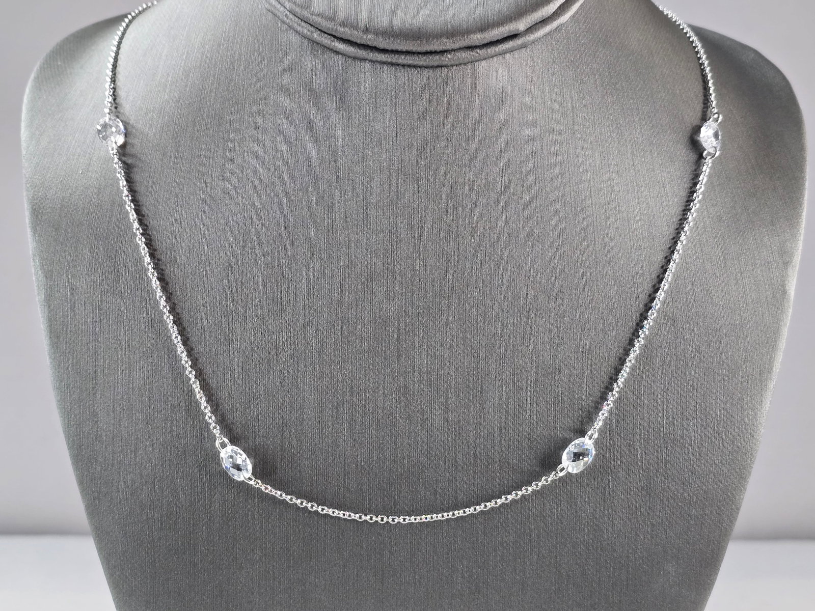 Womens Sterling Silver Modernist CZ Necklace: A WOMENS STERLING SILVER MODERNIST CZ NECKLACE. NECKLACE WEIGHS 6.5g, AND MEASURES 25" LONG BY 1/4" WIDE. MAKES A GREAT GIFT FOR THAT SOMEONE SPECIAL. ANY QUESTIONS, PLEASE ASK. BE SURE TO CHECK OUT O
