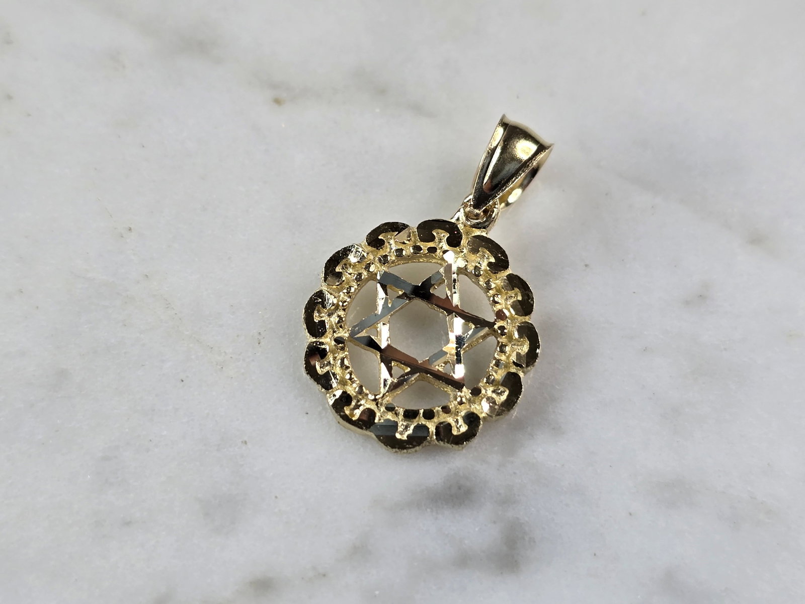 10K Yellow Gold Jewish Judaica Star of David Pendant: A 10K YELLOW GOLD JUDAICA STAR OF DAVID PENDANT. THE PENDANT WEIGHS 1.2g, AND MEASURES 3/4" LONG BY 5/8" WIDE. MAKES A GREAT GIFT FOR THAT SOMEONE SPECIAL. ANY QUESTIONS, PLEASE ASK. BE SURE TO CHECK 