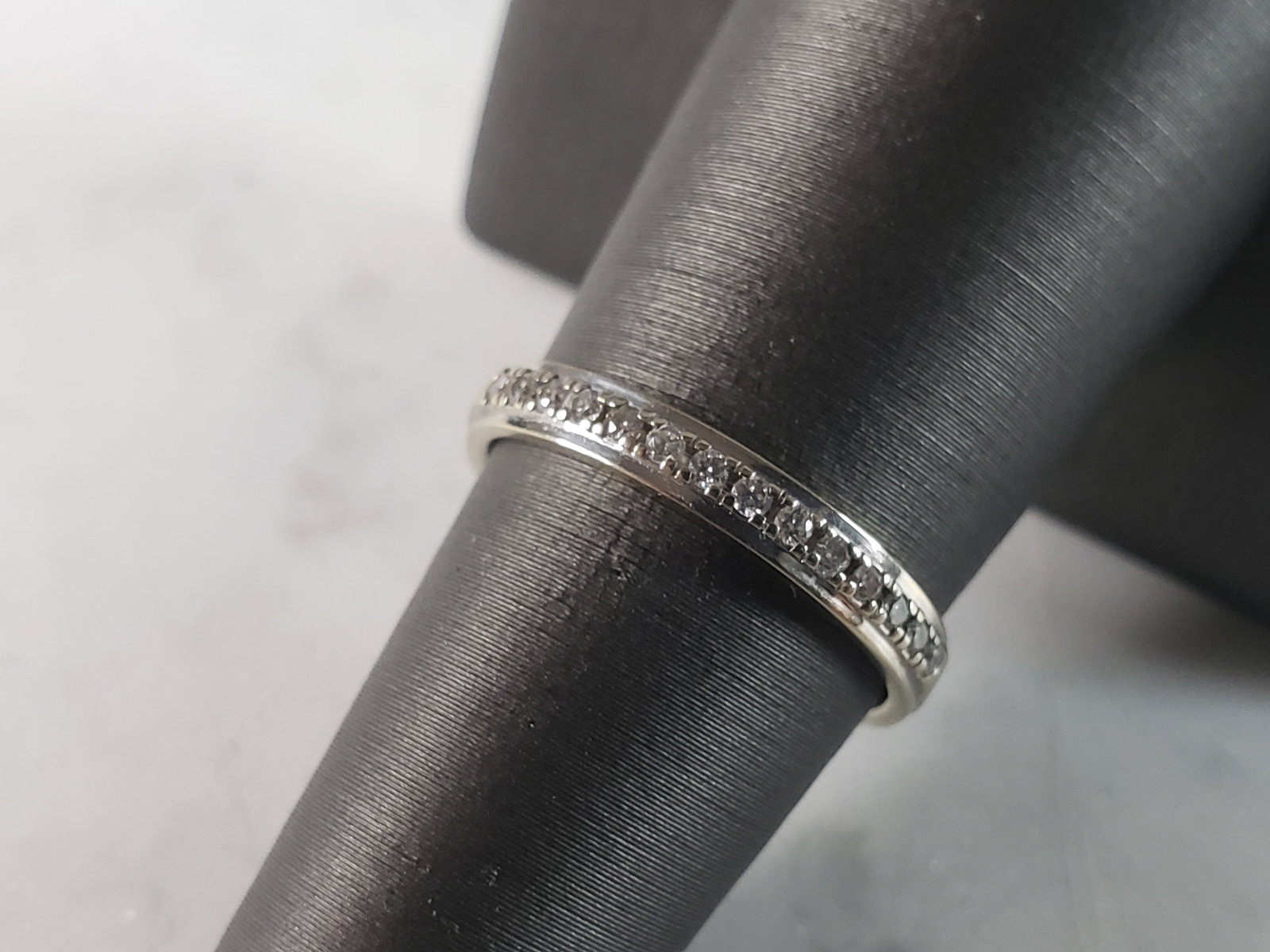 Womens Vintage Estate 10K White Gold Diamond Ring: FOR SALE IS THIS WONDERFUL WOMENS 10K WHITE GOLD DIAMOND RING. THE RING WEIGHS 2.2g. THE SIZE OF THE RING IS 6.75. THE RING HAS ABOUT .14cts OF DIAMONDS IN IT. RING IS NOT MARKED BUT IT HAS BEEN TESTE