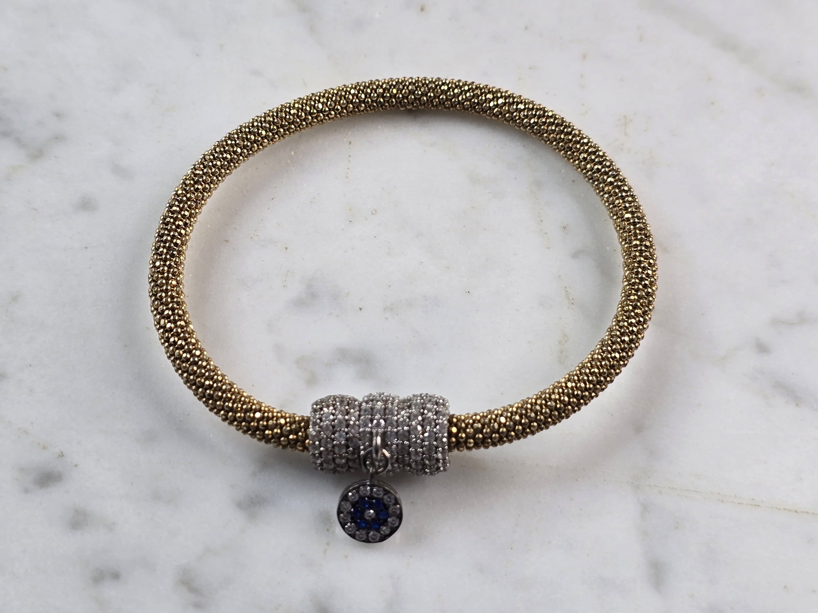 Womens Estate Sterling Silver Gold Tone Mesh Magnetic Bracelet: A WOMENS VINTAGE ESTATE STERLING SILVER GOLD TONE MESH MAGNETIC CLASP BRACELET THAT WEIGHS 13.4g. BRACELET MEASURES 6 3/4" BY 3/8". STONES ARE CZ. ANY QUESTIONS PLEASE DO NOT HESITATE TO ASK. BE SURE 